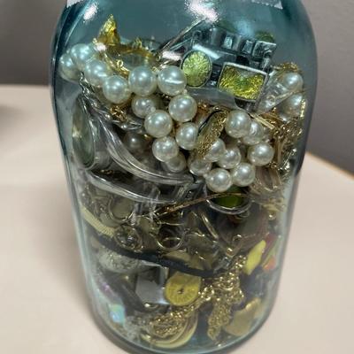 Blue Ball jar filled with crafting jewelry