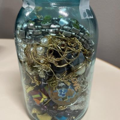 Blue Ball jar filled with crafting jewelry
