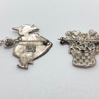 LOT 52: Sterling Mary Engelbreit Hearts in Basket Brooch, "Bloom" Girl with Water Can Brooch and Santa Claus Pin (MEINK)