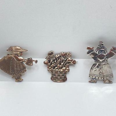 LOT 52: Sterling Mary Engelbreit Hearts in Basket Brooch, "Bloom" Girl with Water Can Brooch and Santa Claus Pin (MEINK)