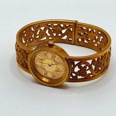 LOT 110: Metropolitan Museum of Art Watch, Van Dell Gold Filled Screw Back Earrings and Gold Tone Chain Link Rhinestone Necklace and More