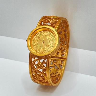 LOT 110: Metropolitan Museum of Art Watch, Van Dell Gold Filled Screw Back Earrings and Gold Tone Chain Link Rhinestone Necklace and More