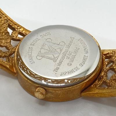 LOT 110: Metropolitan Museum of Art Watch, Van Dell Gold Filled Screw Back Earrings and Gold Tone Chain Link Rhinestone Necklace and More