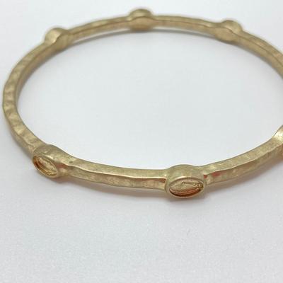 LOT 115: Collection of Gold Tone Bangle Bracelets