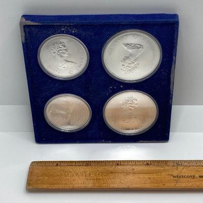LOT 126: 1976 Olympic Special Commemorative Coins - Silver Canadian Coins and Collector Case