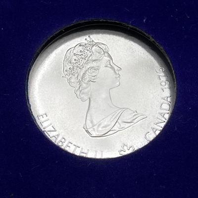 LOT 126: 1976 Olympic Special Commemorative Coins - Silver Canadian Coins and Collector Case