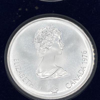 LOT 126: 1976 Olympic Special Commemorative Coins - Silver Canadian Coins and Collector Case