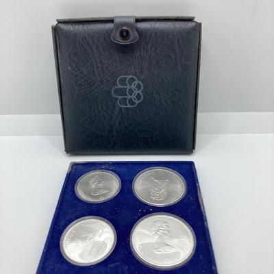 LOT 126: 1976 Olympic Special Commemorative Coins - Silver Canadian Coins and Collector Case
