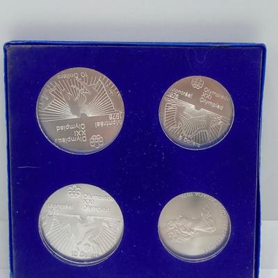 LOT 126: 1976 Olympic Special Commemorative Coins - Silver Canadian Coins and Collector Case
