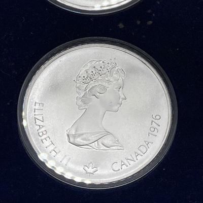 LOT 126: 1976 Olympic Special Commemorative Coins - Silver Canadian Coins and Collector Case