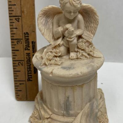 An Angel Lot- Angel upon column trinket box and sting of resin angel figurines