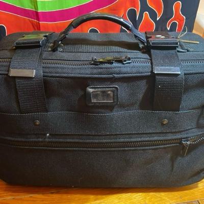 Men's Luggage and a super comfy travel neck pillow.