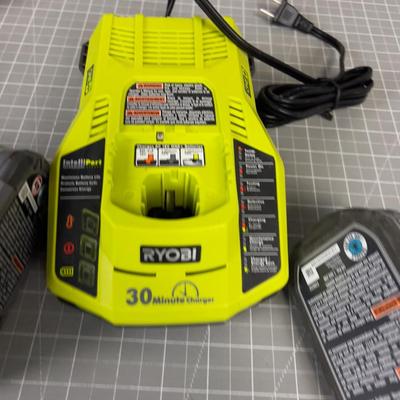 2 RYOBI Lithium Batteries with charger. 