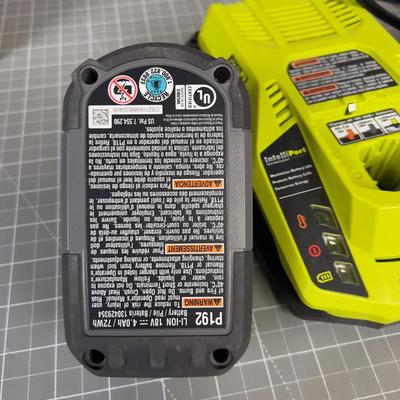 2 RYOBI Lithium Batteries with charger. 