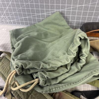 Pile of Misc. Army Gear; Suspenders & Duffel Bag