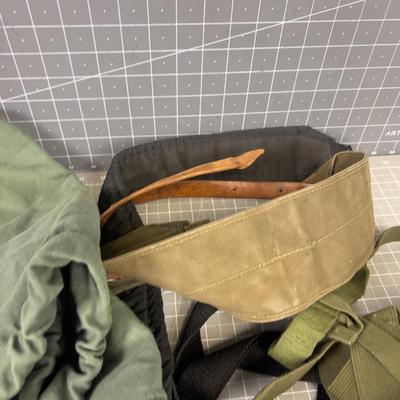 Pile of Misc. Army Gear; Suspenders & Duffel Bag