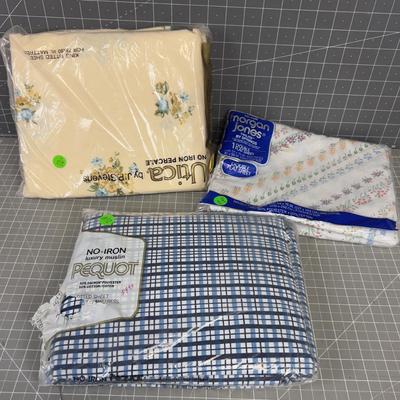 2 Vintage One Flat Sheets and two Fitted 