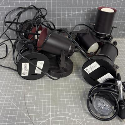 Pile of Can Lights individually corded