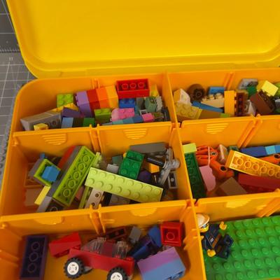 Legos, in a Lego Carrying Case, with a Lego Gray Mat