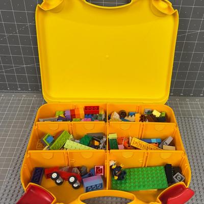 Legos, in a Lego Carrying Case, with a Lego Gray Mat