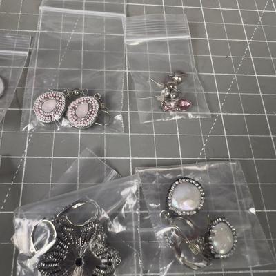 10 Pair of Silver Toned Pretty Earrings. 