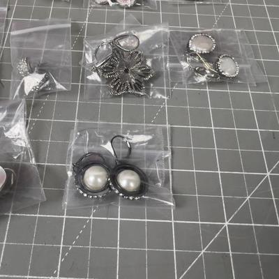 10 Pair of Silver Toned Pretty Earrings. 