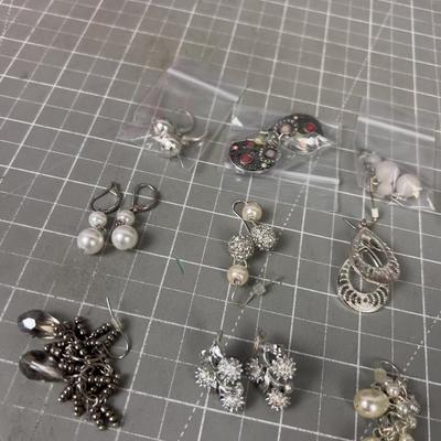 White and Silver Grouping of Earrings