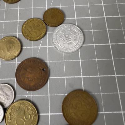 Pile of Foreign  Coin Plus Tokens 