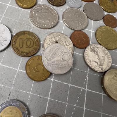 Pile of Foreign  Coin Plus Tokens 