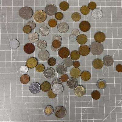 Pile of Foreign  Coin Plus Tokens 