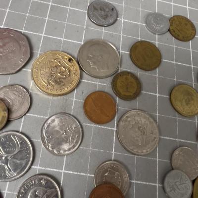 Pile of Foreign  Coin Plus Tokens 
