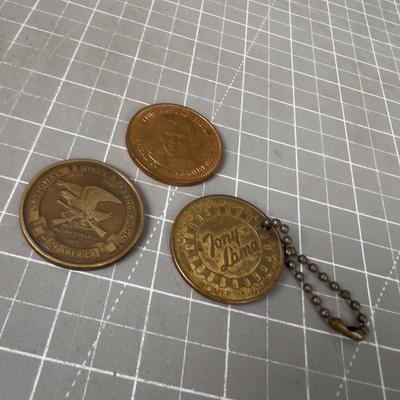3 Coins: NRA, Elvis and Tony Lama 