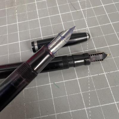 2 Black Fountain Pens. Gold Nib on one