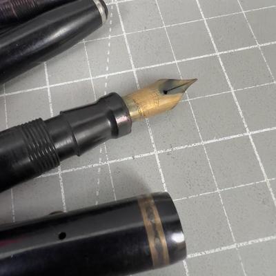 2 Black Fountain Pens. Gold Nib on one