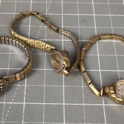 2 Gold Filled Watches and 1 that is not but Gold toned color