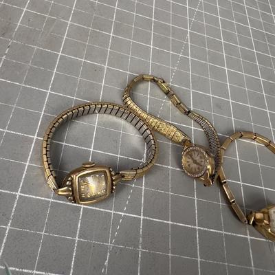 2 Gold Filled Watches and 1 that is not but Gold toned color