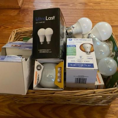 Light up your life with a BASKET filled with lightbulbs and 3 boxes of under cabinet light kits!