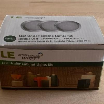 Light up your life with a BASKET filled with lightbulbs and 3 boxes of under cabinet light kits!