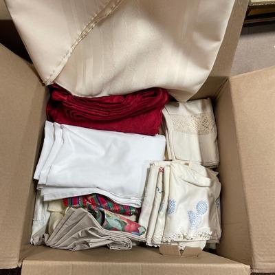 Box of tablecloths, pillowcases and sheets