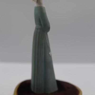 Vintage Porcelain Nun with Velvet Stand