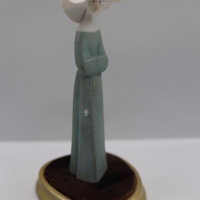 Vintage Porcelain Nun with Velvet Stand
