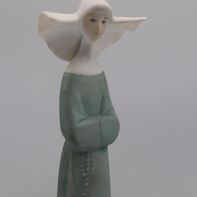 Vintage Porcelain Nun with Velvet Stand