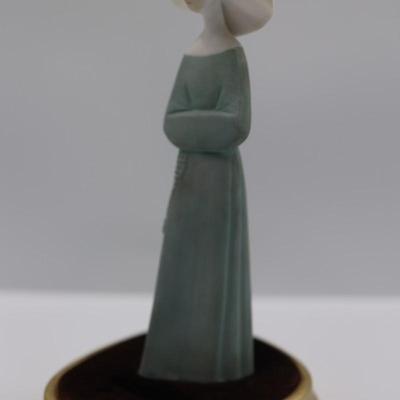 Vintage Porcelain Nun with Velvet Stand