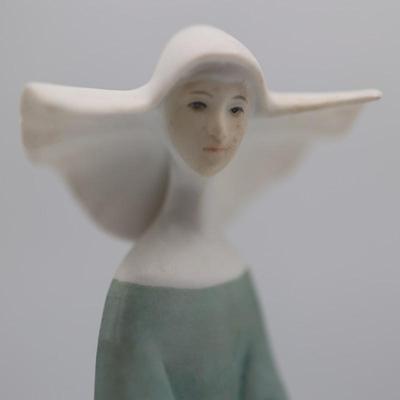 Vintage Porcelain Nun with Velvet Stand