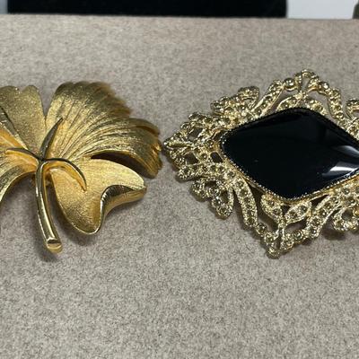 Black and gold tone jewelry
