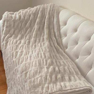 Snuggle under this super soft, comfortable blanket as you watch tv!