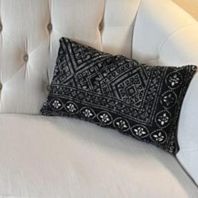 Two small black and white Southwestern style decorative pillows