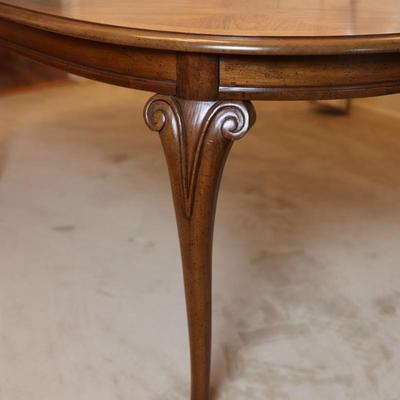 Solid Wood Dining Table with Two Leaves