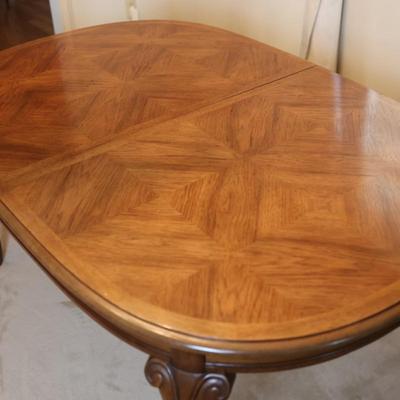 Solid Wood Dining Table with Two Leaves