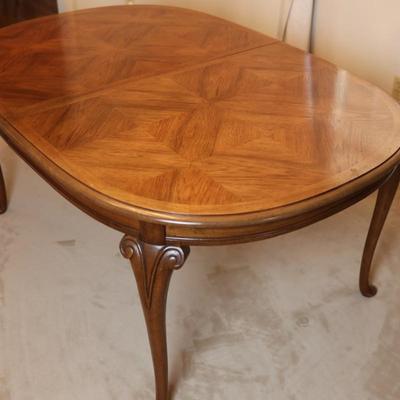 Solid Wood Dining Table with Two Leaves